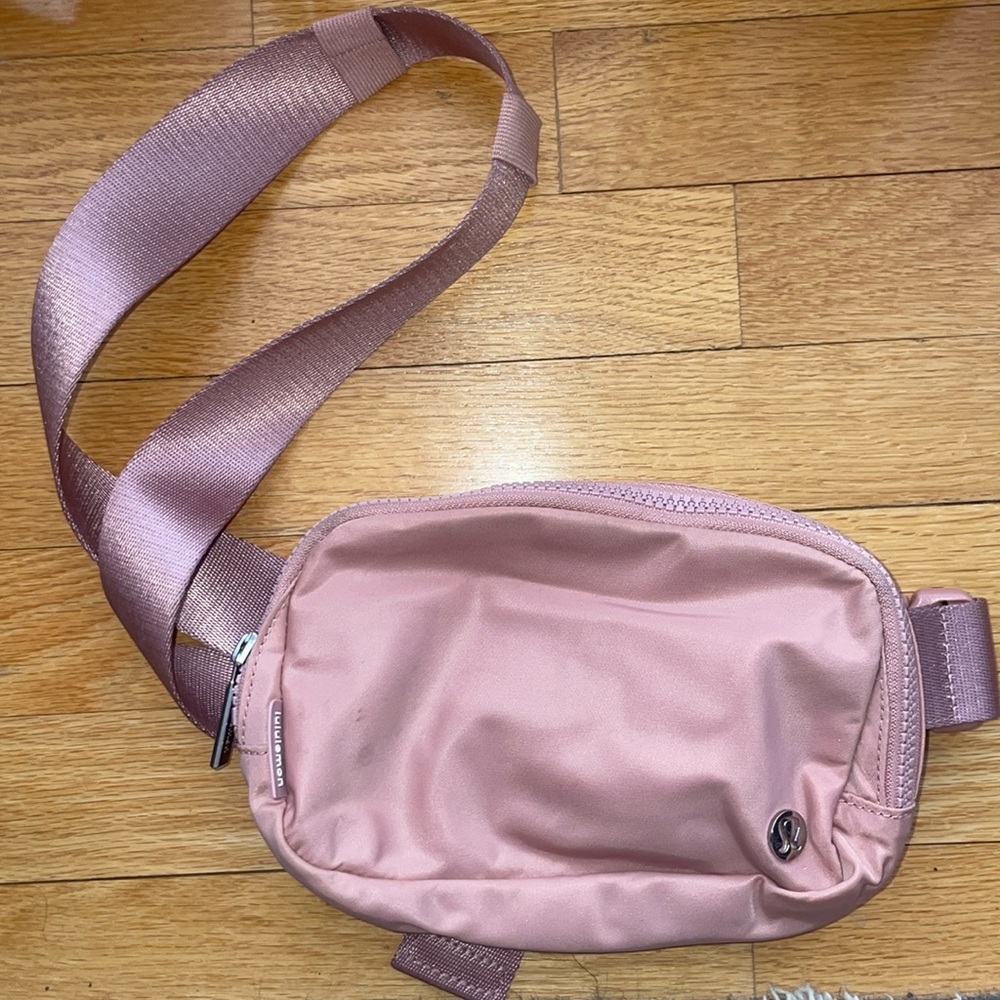 Lightly worn mauvey-light pink lululemon belt bag